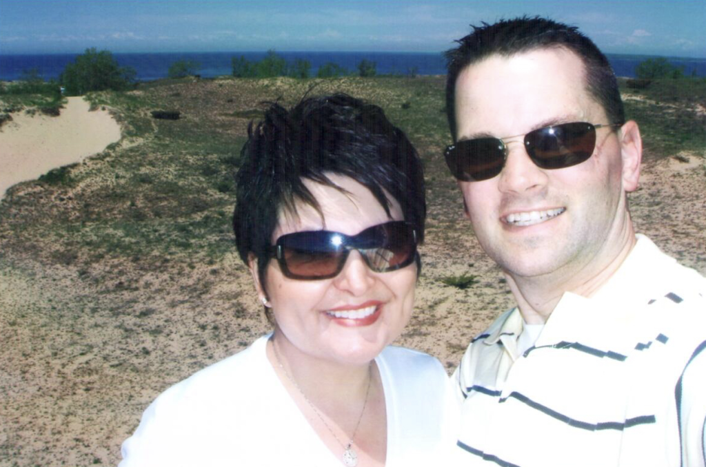 Two friends smiling together outdoors demonstrating strong friendship bond